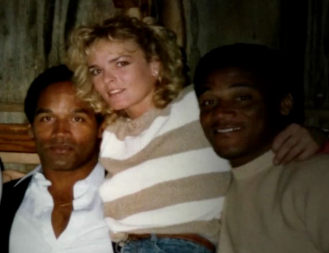 Archival photograph of O.J. Simpson, Nicole Brown Simpson and A.C. Cowlings